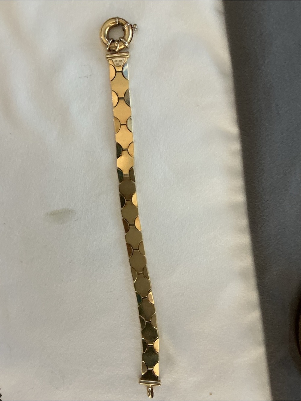 Beautiful 14 karat gold MI designer bracelet